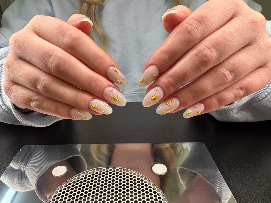 Nude almond nails with gold detail