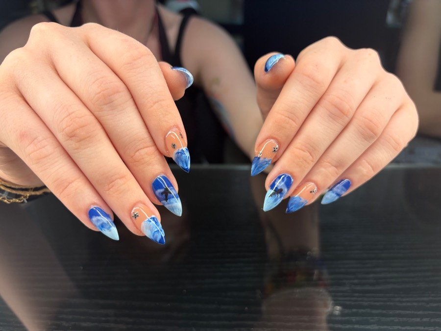 Blue marbled almond nails